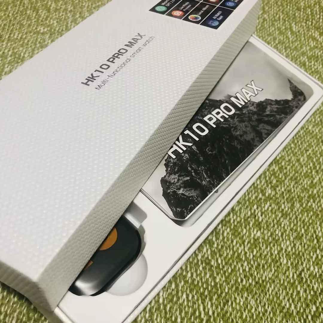 HK 10 Pro Max packaging on a green textured surface